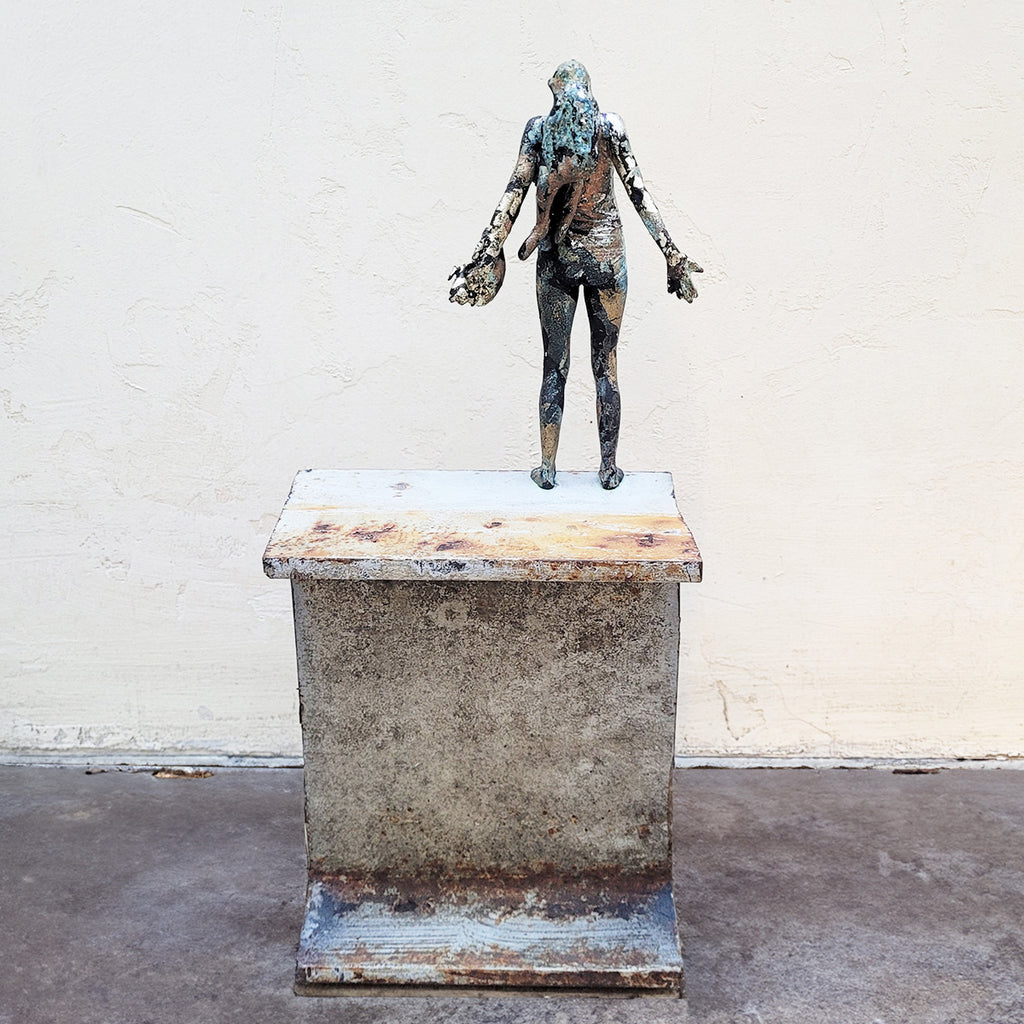 rear view of Johnny Vegas Sculpture - Motion captured 3D printed figure mounted on a salvaged RSJ steel girder featuring gold and silver leaf
