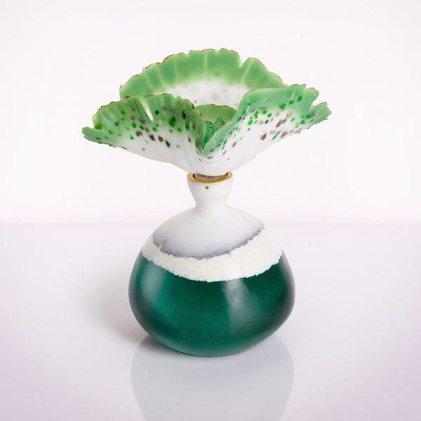 Aqua Mutalism Bottle made from cast glass and pate de verre by glass artist Verity Pulford part of the Bluecoat Display Centre Plant based exhibition