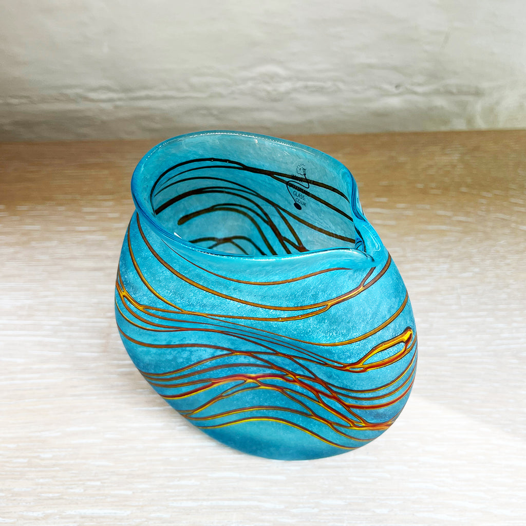 view inside small clutch jug from Will Shakspeare's 'Random Trails' range, inspired by walking in the Elan Valley in Wales.  This contemporary glass jug is predominently aqua with threads of gold colour. Will has been making his own inimitable glassware for nearly 30 years and is one of the country's most collected makers