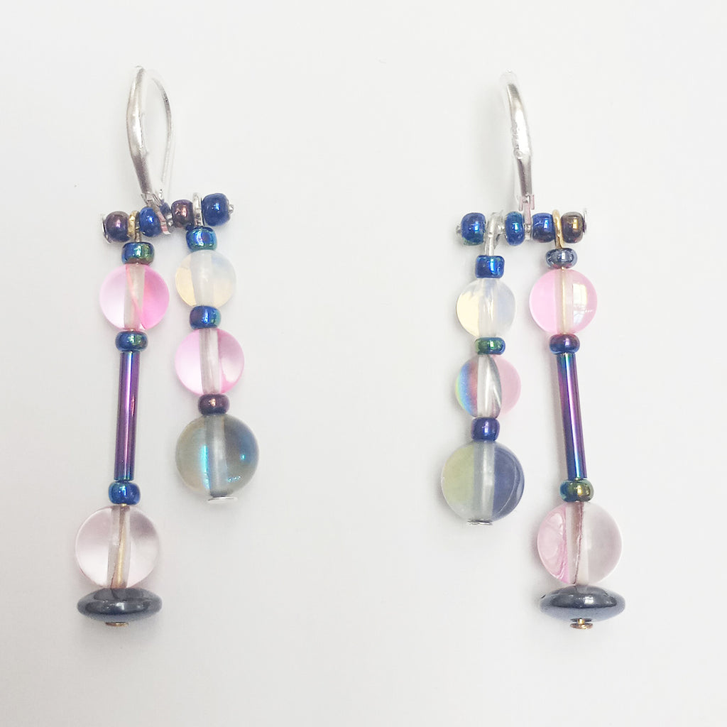 beautiful dyed quartz triple bead earrings with two strands of different length and feature various glass beads in pinks, blues and smoky grey