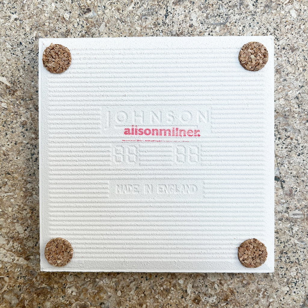 underside of ceramic tile coaster by Alison Milner - the set of 4 available from Bluecoat Display Centre, illustrate British Weeds from artist Alison Milner's childhood memories