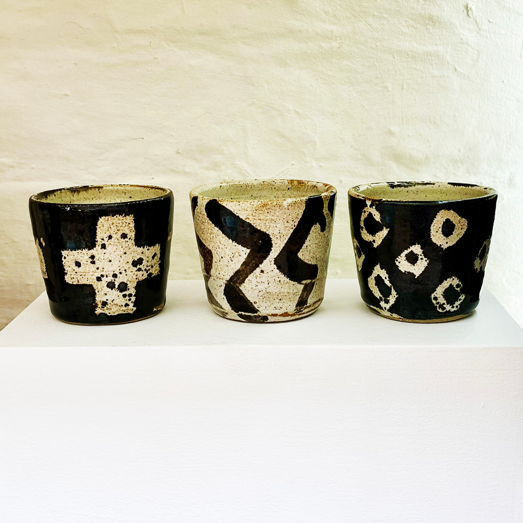 3 Stoneware Beakers with co-ordinating motifs by Nicola Gillis at The Bluecoat Display Centre for contemporary ceramics and design