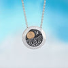 kinetic pendant by Alan Ardiff contemporary Irish jewellery - made of silver with an 18kt Gold sun, the design features a rising and setting sun to appreciate the rolling landscape of a beautiful day