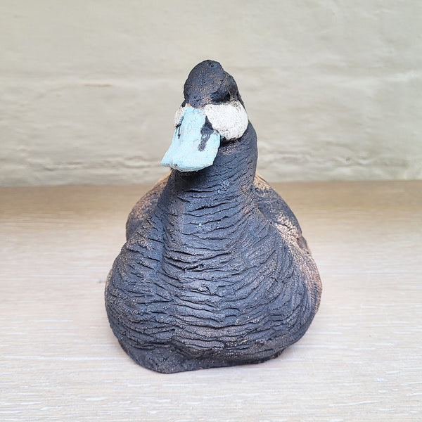 Front view of Blue Bill Duck sculpture by contemporary ceramicist Guy Holder, hand sculpted and then delicately decorated by hand