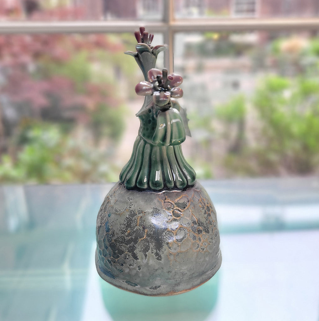 contemporary ceramci botanical sculpture by Michelle Young Hares at Bluecoat Display Centre - side view