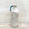 A ballclay rough textured bottle vase with a blue stoneware twisted handle by contemporary ceramicist John Kershaw