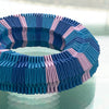 Detail of bold chunky blue and purple paper bracelet by Rike Lenzing in blue, lilac and purple paper 