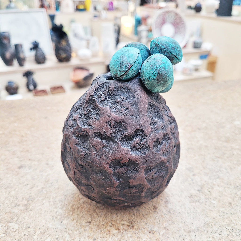 side view of Contemporary Ceramic Vessel 'Colours: Blundellsands' by Sarah Kirk on display at The Bluecoat Display Centre Liverpool