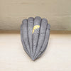 contemporary ceramic dark leaf pod by Ellul Ceramics featuring 24ct gold leaf