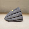 right side view of contemporary ceramic dark leaf pod by Ellul Ceramics featuring 24ct gold leaf