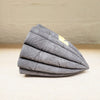 side view of contemporary ceramic dark leaf pod by Ellul Ceramics featuring 24ct gold leaf at Bluecoat Display Centre