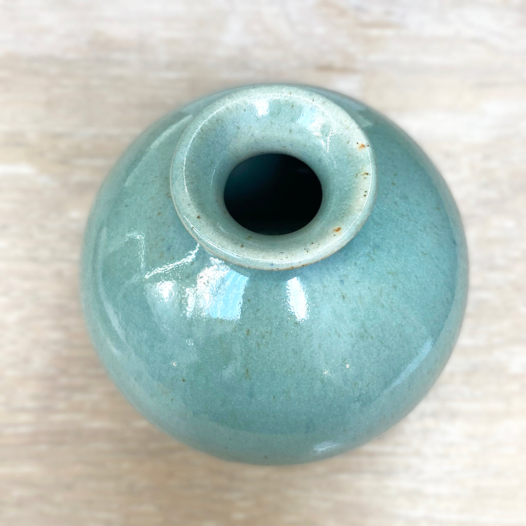 top of ‘Fake’ Celadon Bottleneck Budvase by contemporary ceramicist Daniel Smyth