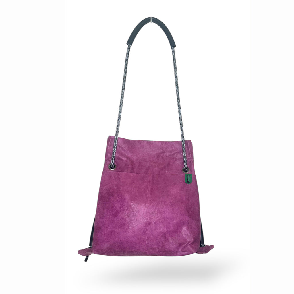 Studio Ditto Fuchsia Pink Faux Leather 2in1 bag shown hanging as a tote
