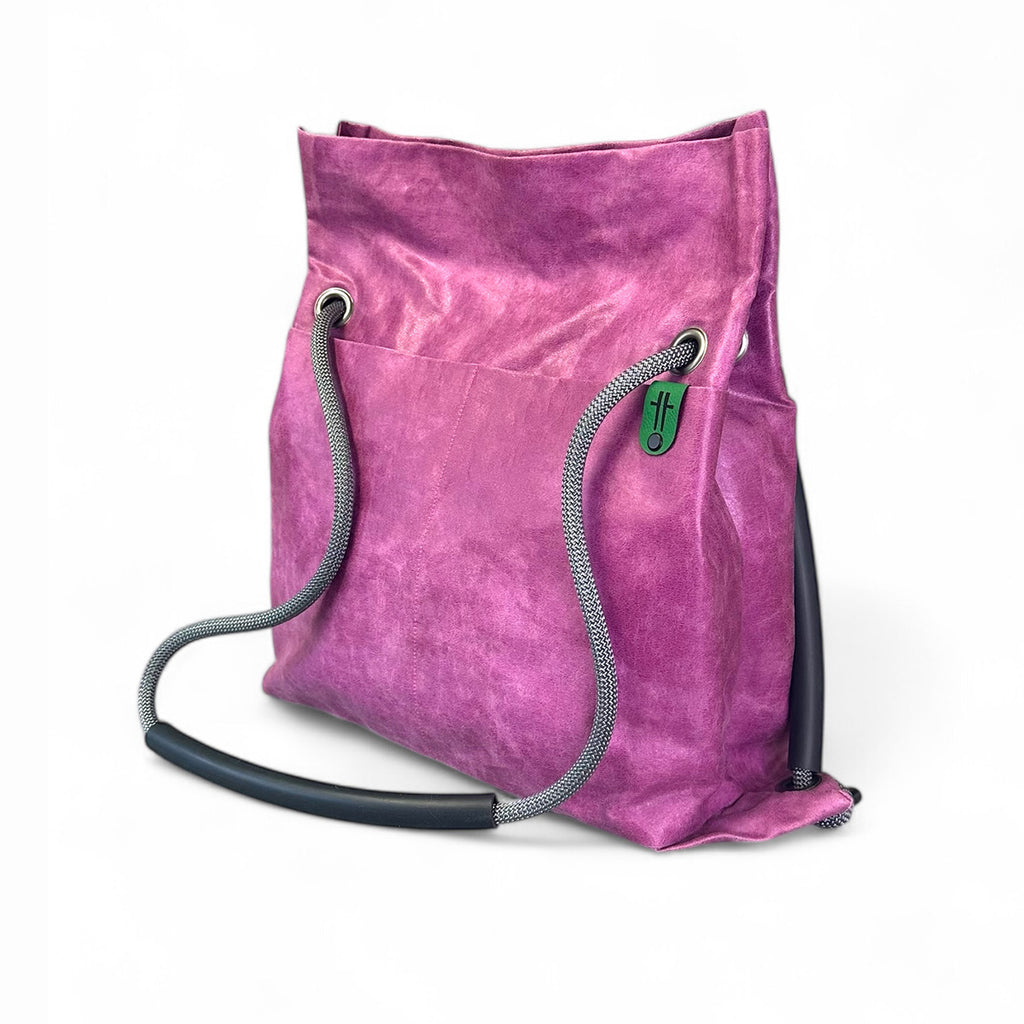Studio Ditto Fuchsia Pink Faux Leather 2in1 bag shown as a backpack
