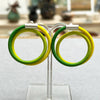 Double Loop Lemon & Lime earstuds by Gilly Langton in silver and hand dyed elastic photographed at The Bluecoat Display Centre