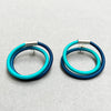 contemporary blue green double loop earstuds are the perfect way to add a pop of colour to any outfit. In silver and hand dyed elastic by Gilly Langton