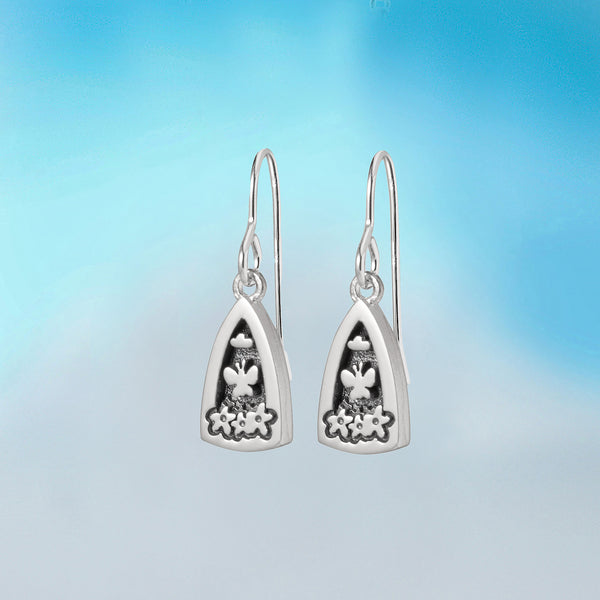 silver earrings by contemporary irish jeweller Alan Ardiff which feature elements of nature including butterflies, clouds and flowers to capture the beautiful moments that happen in the garden