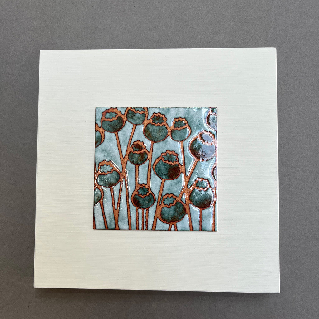 Poppy Heads wall art vitreous enamel panel by Janine Partington on MDF wall panel
