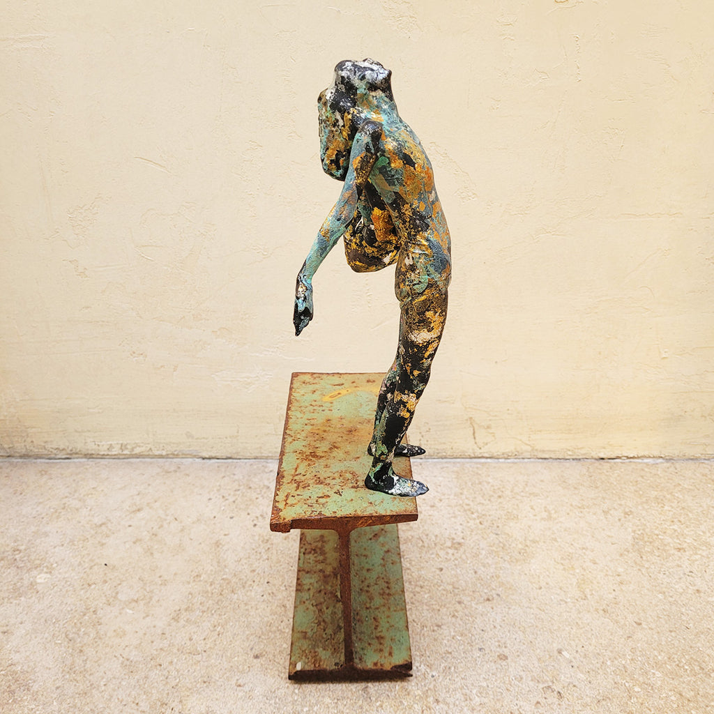 Johnny Vegas sculpture created with a  motion captured 3D printed figure mounted on a salvaged RSJ steel girder. The nylon figure has been patinated using bleach which creates amazing colours, with highlights of silver and gold leaf.