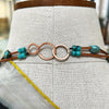 Clasp detail of Turquoise and copper necklace by Liverpool maker Kate Moult shown on a manequin