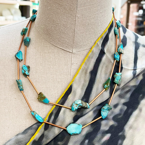Turquoise and copper necklace with a handmade copper catch by Liverpool maker Kate Moult. This is a gorgeous double stranded necklace. Photographed at Bluecoat Display Centre on a manequin
