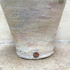 Detail of makers mark on pale ballclay stoneware vase with a crackled texture and two small handles at the sides by contemporary ceramicist John Kershaw