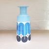 Large contemporary ceramic cone bottle by MAP MAP this piece is predominently white background with shades of blue and black in the pattern