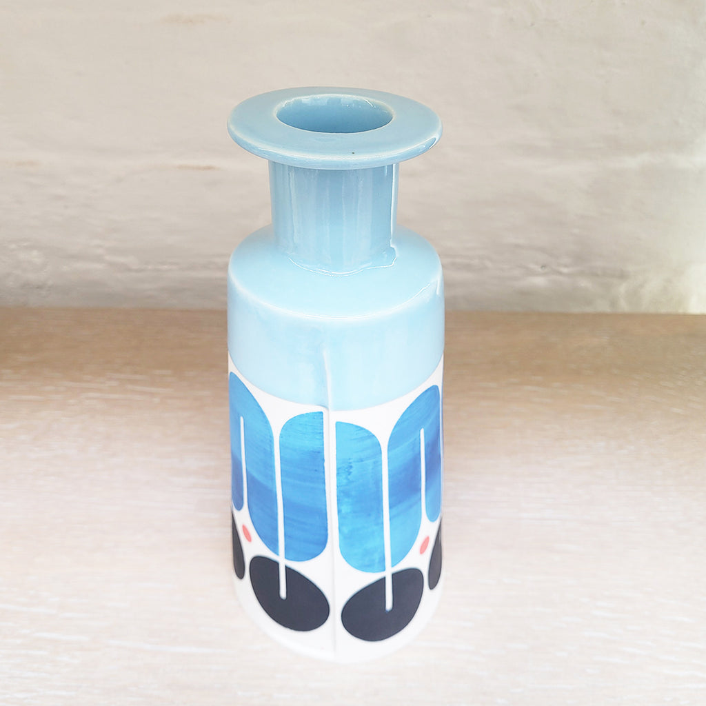 Top view of Large contemporary ceramic cone bottle by MAP MAP this piece is predominently white background with shades of blue and black in the pattern