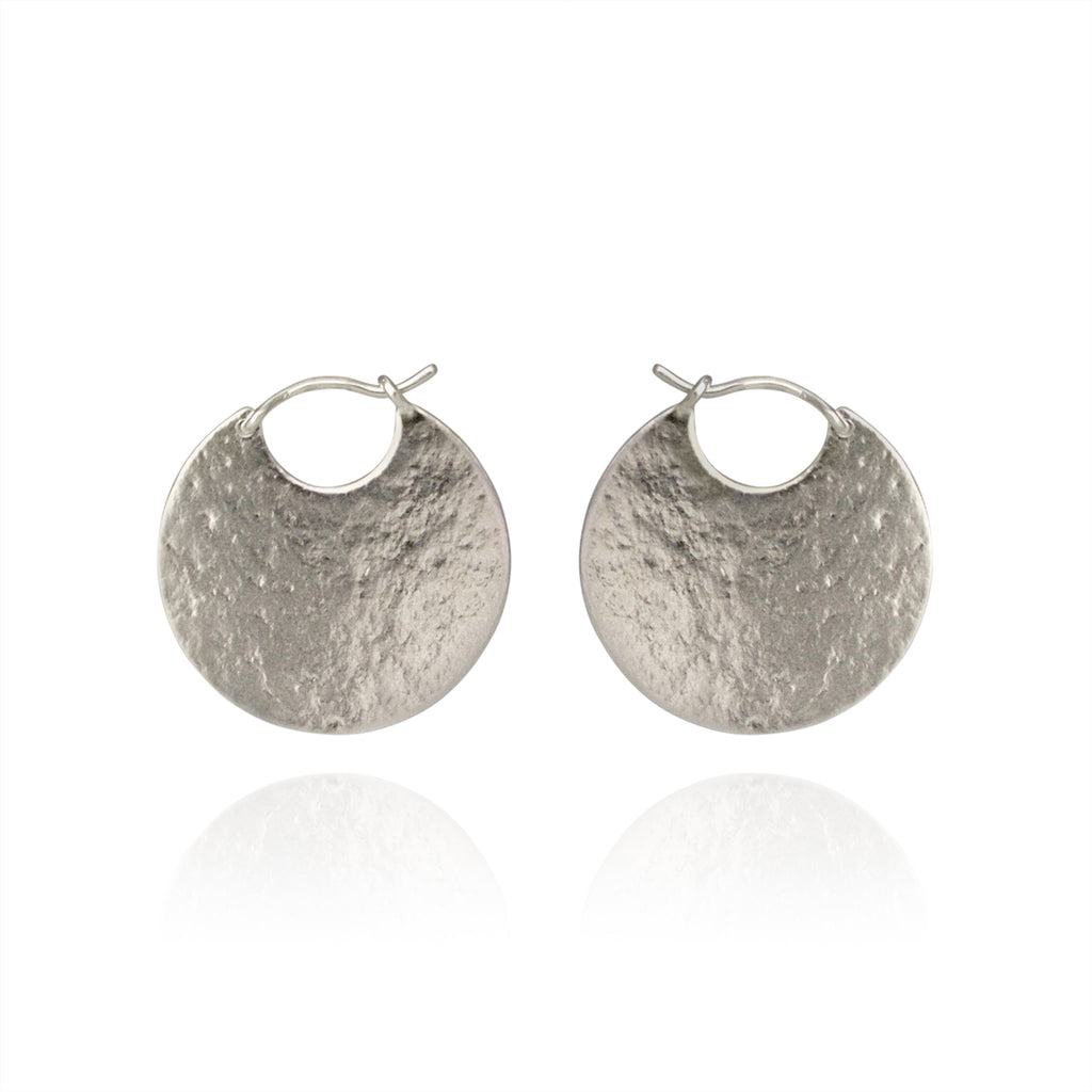Large Disc hoop earrings in Sterling Silver by contemporary jeweller Cara Tonkin
