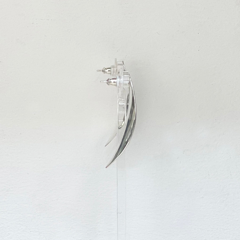 Side view of Eye-catching leaf shaped drop earrings in Silver by Irish Silversmith Kevin O’Dwyer