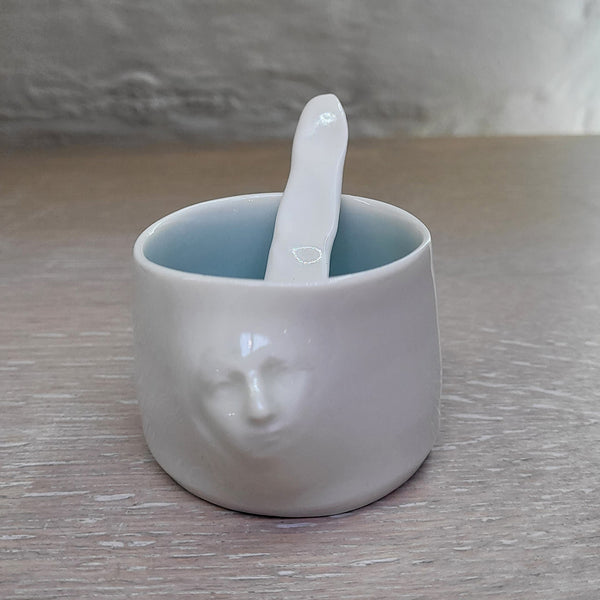 Mini Dish & Spoon by Anja Lubach with the face of the Madonna. White porcelain with a delicate blue glaze