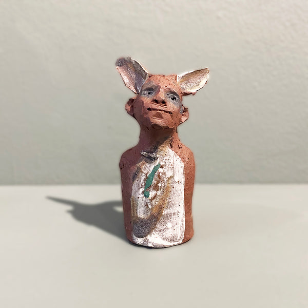 Miniature Ceramic Faun figure with large 'listening ears' loosely inspired by creation stories, from folklore by contemporary ceramicist Sharon Griffin