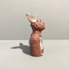 Right Side View of Miniature Ceramic Faun figure with large 'listening ears' loosely inspired by creation stories, from folklore by contemporary ceramicist Sharon Griffin