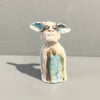Miniature figure with large 'listening ears' loosely inspired by creation stories, from folklore by contemporary ceramicist Sharon Griffin