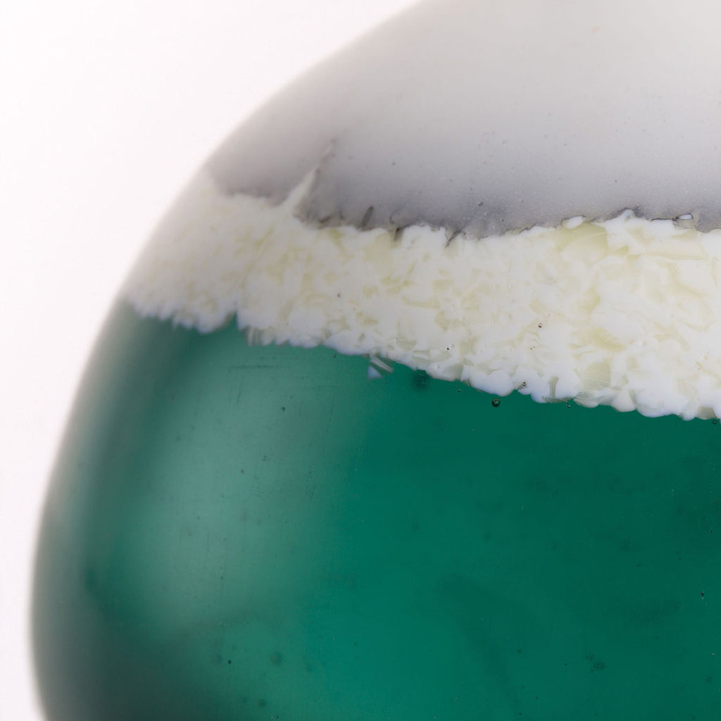 close up of the base of Aqua Mutalism Bottle made from cast glass and pate de verre by glass artist Verity Pulford part of the Bluecoat Display Centre Plant based exhibition
