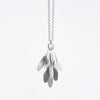 sterling silver pendant inspired by clusters of ash seeds, with leaf skeleton imprints on one side. Each key hangs separately so it has lovely movement.