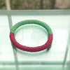necklace that also doubles as a bracelet made of pink and green paper by Rike Lenzing