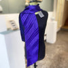 Mannequin wearing knotted statement noon  scarf in Purple/Indigo by Nawal Gebreel at the Bluecoat Display Centre