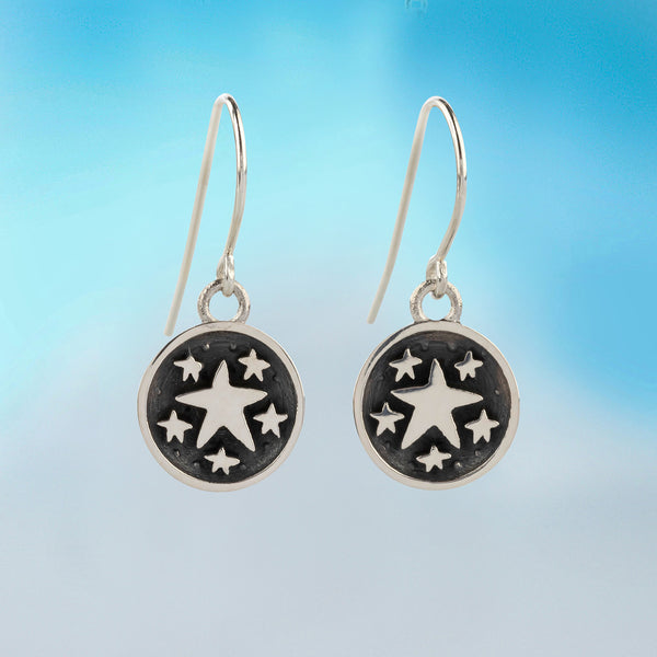 This pair of earrings are made of silver and features a multitude of scattered stars, made for that special person in your life. By contemporary Irish jeweller 
Alan Ardiff

