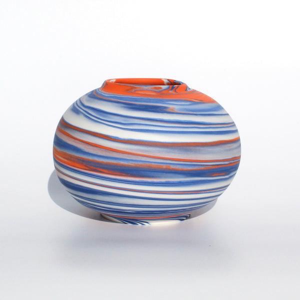 striking vase by contemporary ceramicist Corinne Price with a marbled abstract design using the clay as a vessel to create a bold design.