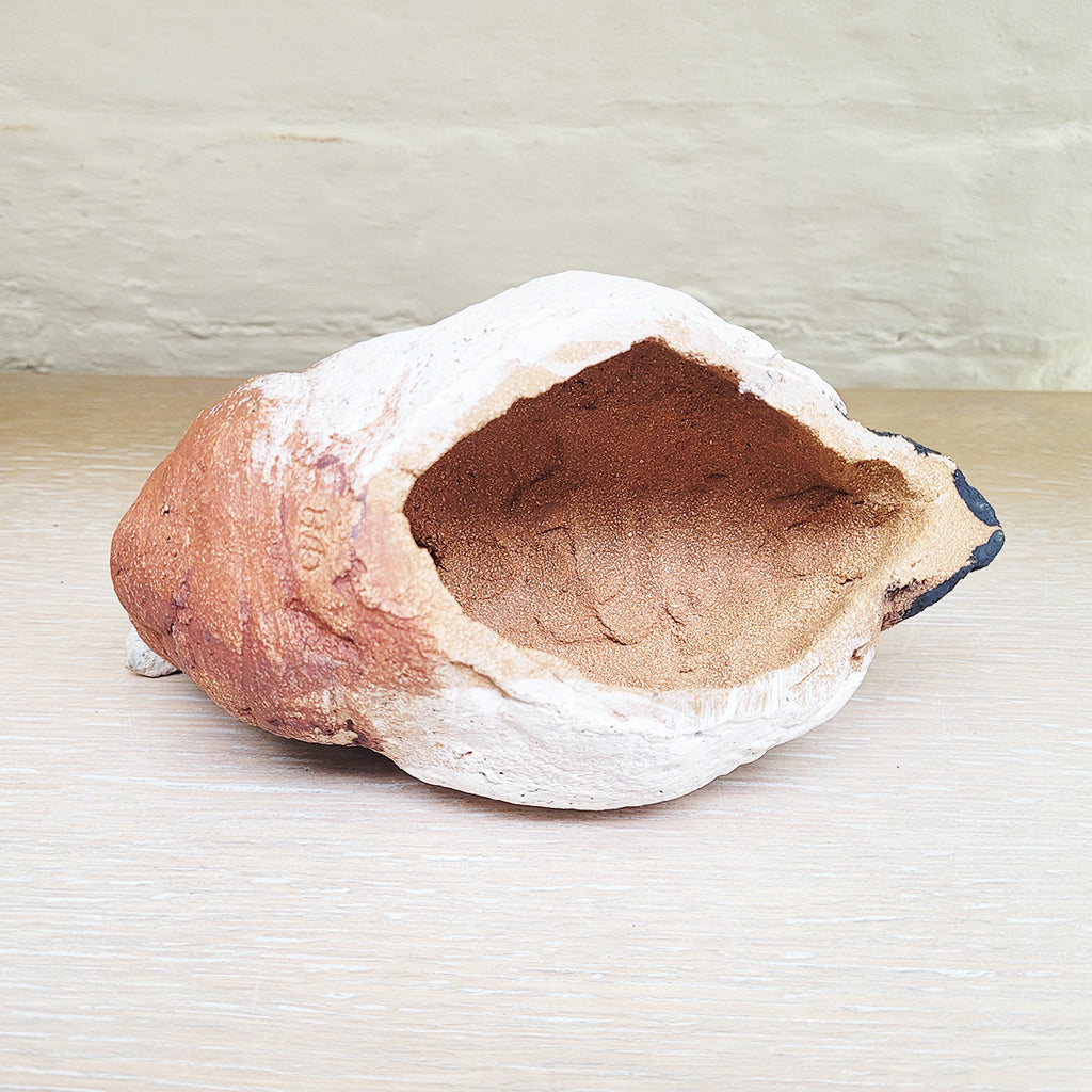 Base of Red Neck Duck sculpture by Guy Holder showing the makers mark.  A contemporary Ceramic piece available from the Bluecoat Display Centre
