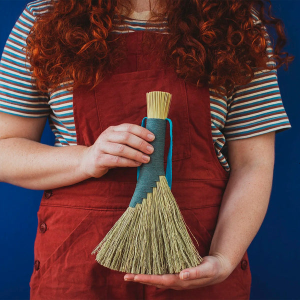 Teal broomcorn brush by Rosa Harradine Made from broomcorn, hemp cord and cotton strap
