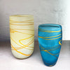 A collection of 2 of the 3 vases from contemporary glass worker Will Shakspeare's 'Random Trails' range, inspired by walking in the Elan Valley in Wales