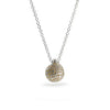 Silver pebble pendant with an organic finish and hand-etched words in gold by contemporary jeweller Diana Porter