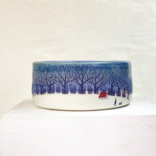 beautiful small hand thrown blue bowl adorned with a homely winter scene by Julia Smith.