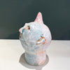 side view of Small Ceramic Head with Cone by contemporary ceramicist Chris Turrell