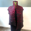 star pleat printed scarf by Nawal Gebreel shown worn open like a shawl on a manequin
