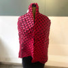 star pleat printed scarf by Nawal Gebreel shown draped like a shawal around a manequin
