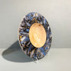 Side View of turned sycamore bowl with blue and gold abstract design  hand painted using acrylic to resemble a celestial scene, then coated with a lacquer finish and polished by Bernie Yates