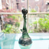 A tall botanical sculpture by Michelle Young Hares is a fantastic piece of contemporary ceramic art